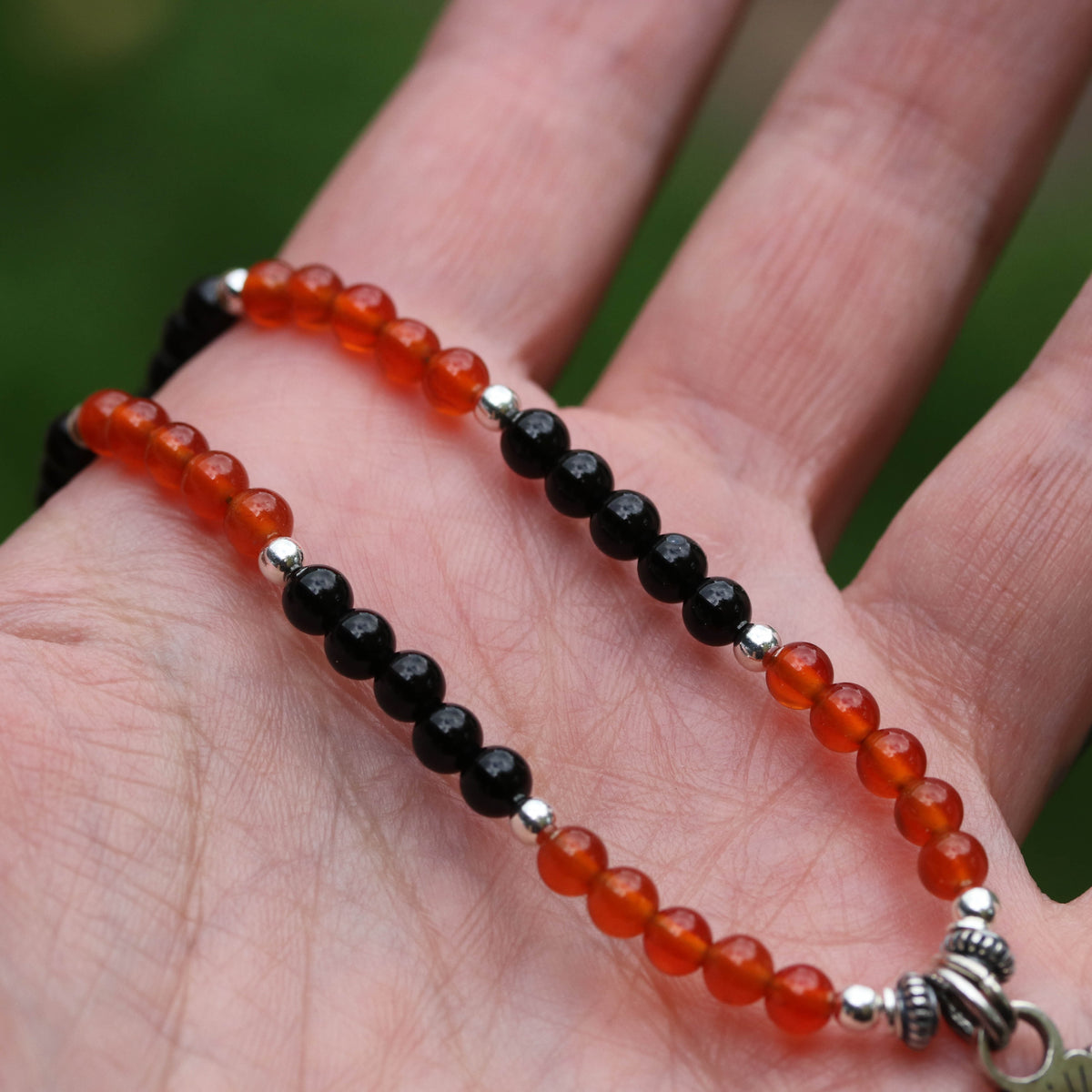 Floating Ghost - Carnelian & Onyx Beaded pendant