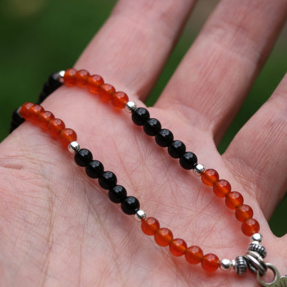 Floating Ghost - Carnelian & Onyx Beaded pendant