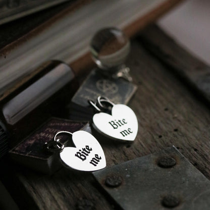 Bite me charm