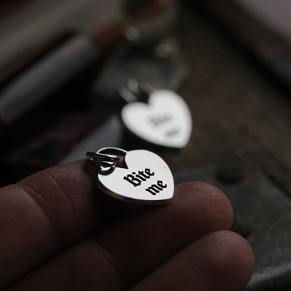 Bite me charm