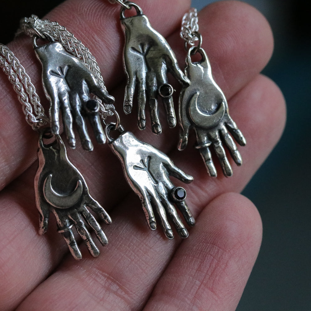 Supreme hand of protection pendant