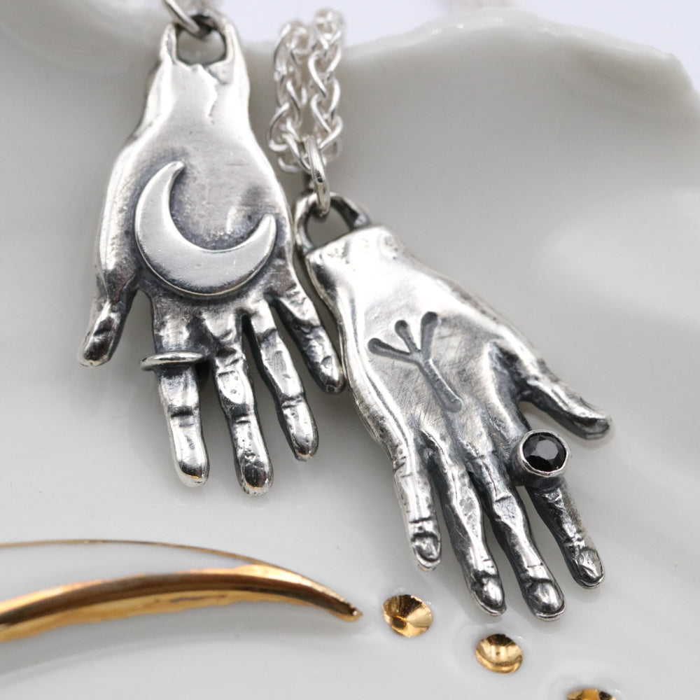 Supreme hand of protection pendant